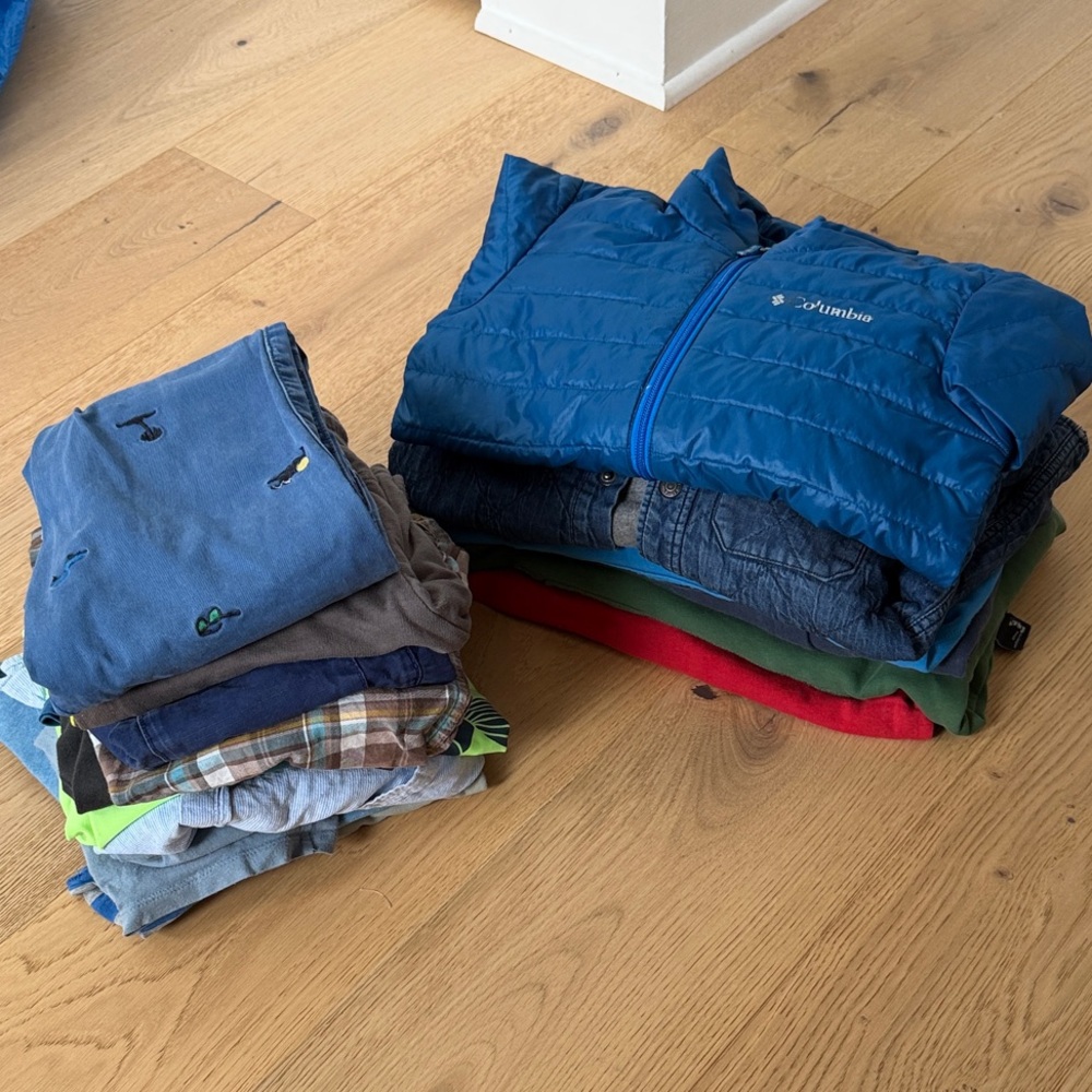 Lots of clothes for an 8-year-old boy